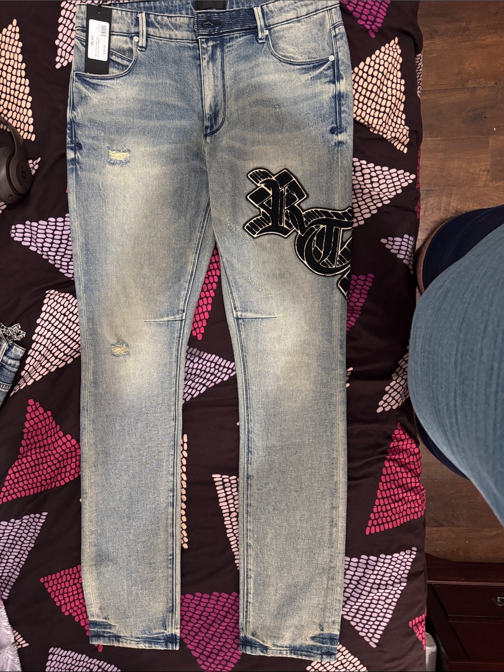 RtA Light Blue Skinny Jeans with Black Script Patch